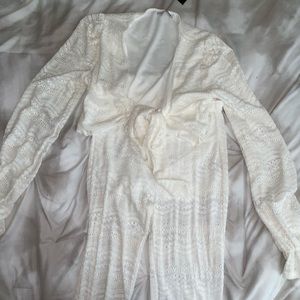 White two piece set with lace detail.